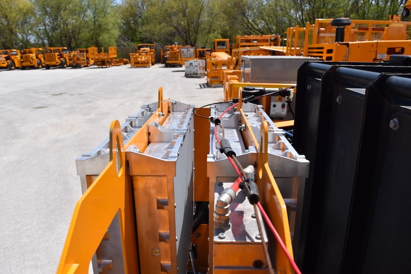 A picture of Maclean's Mine-Mate Series BT2 & BT3-Boom Truck that are leveraged MEDATech's hydraulic system design services and our proprietary 25kW on-board charging solution.