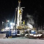 A picture of complete oil rig set up. Highligting the first drilling rig for angled holes in oil and gas applications using a Schramm TXD 130